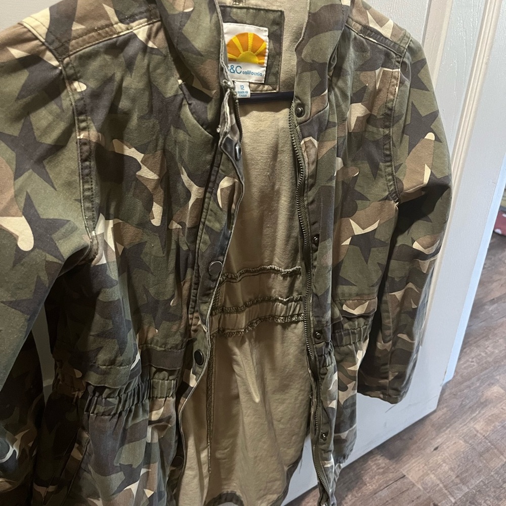 Girl size 12 camo lightweight coat.